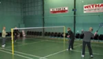 playing badminton doubles