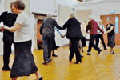 Doing English Folk Dancing in the church hall